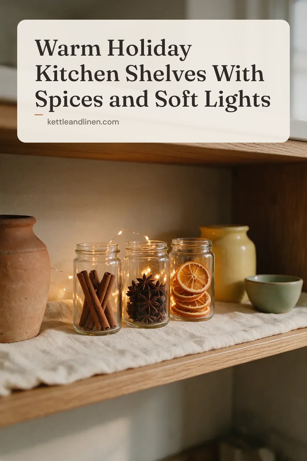 An open kitchen shelf with glass spice jars and warm fairy lights glowing in the evening.