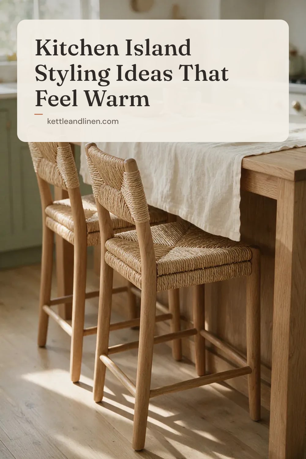 Rattan stools under an oak kitchen island with a linen runner.