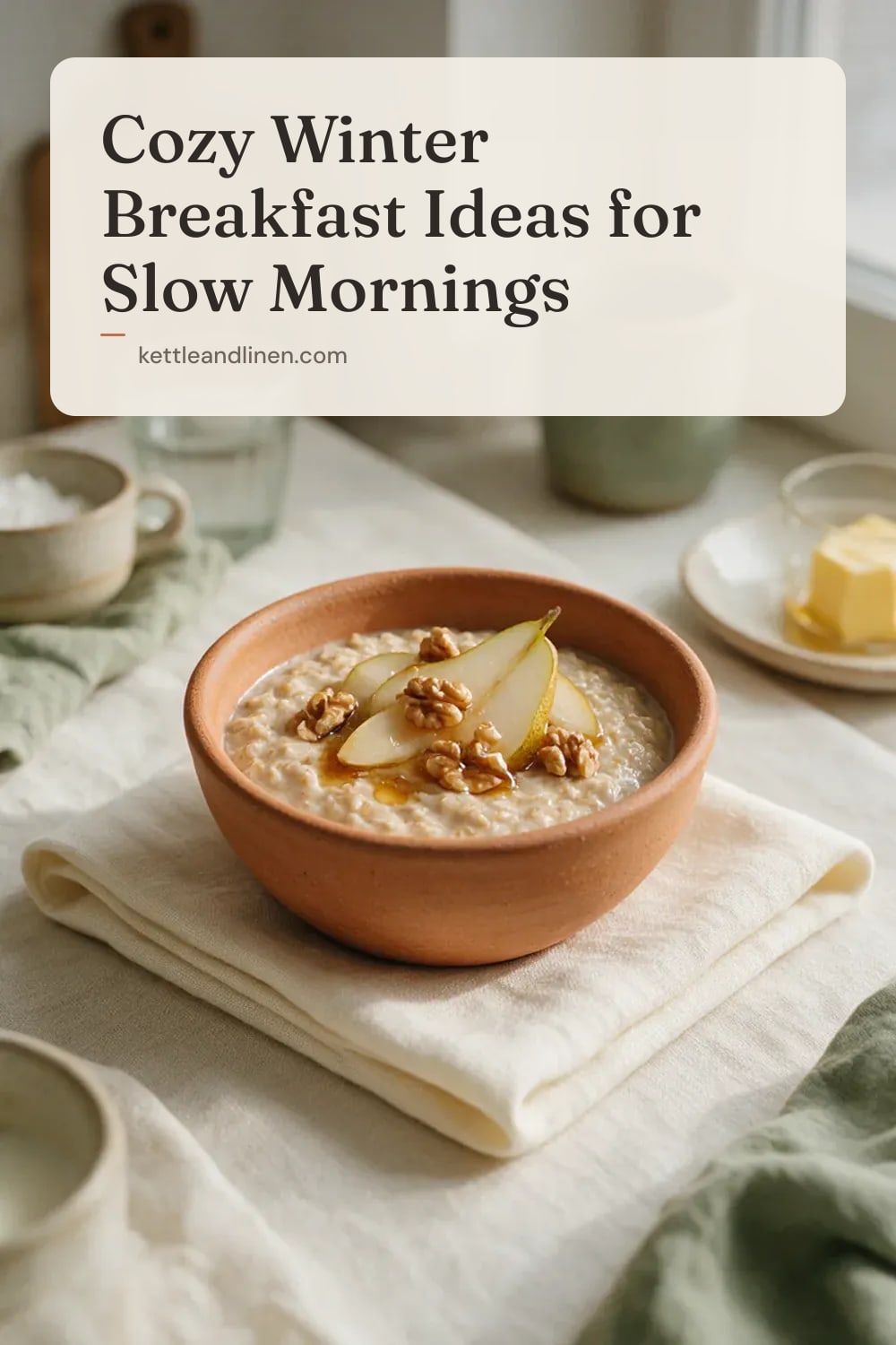 A stoneware bowl of oat porridge with pears, walnuts and honey.